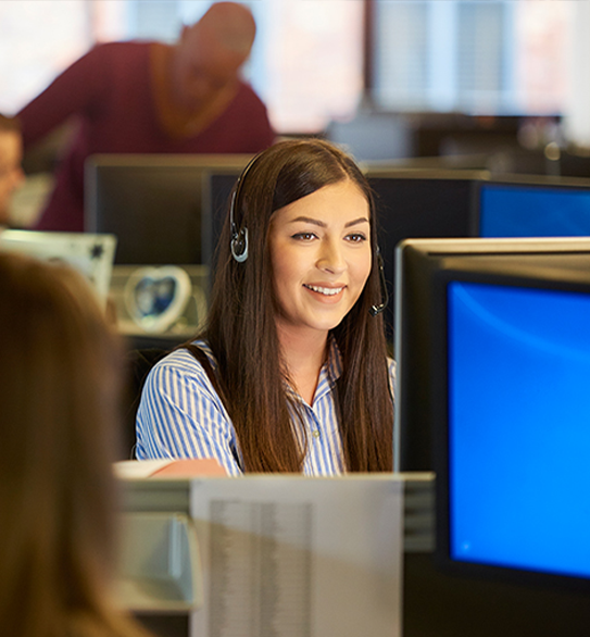 Woman answering phones in a call center